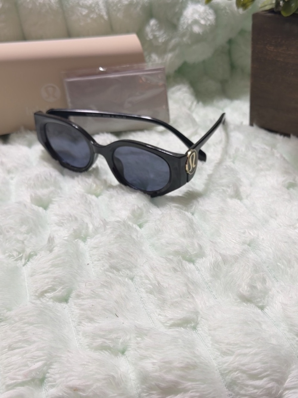lululemon athletica Black Oval Sunglasses with Gold Logo Accent
